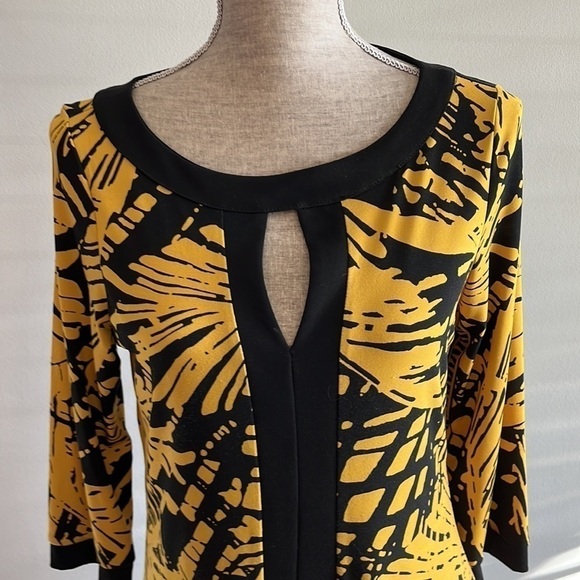 INC size medium yellow and black tunic with keyhole opening in front. - Picture 2 of 4